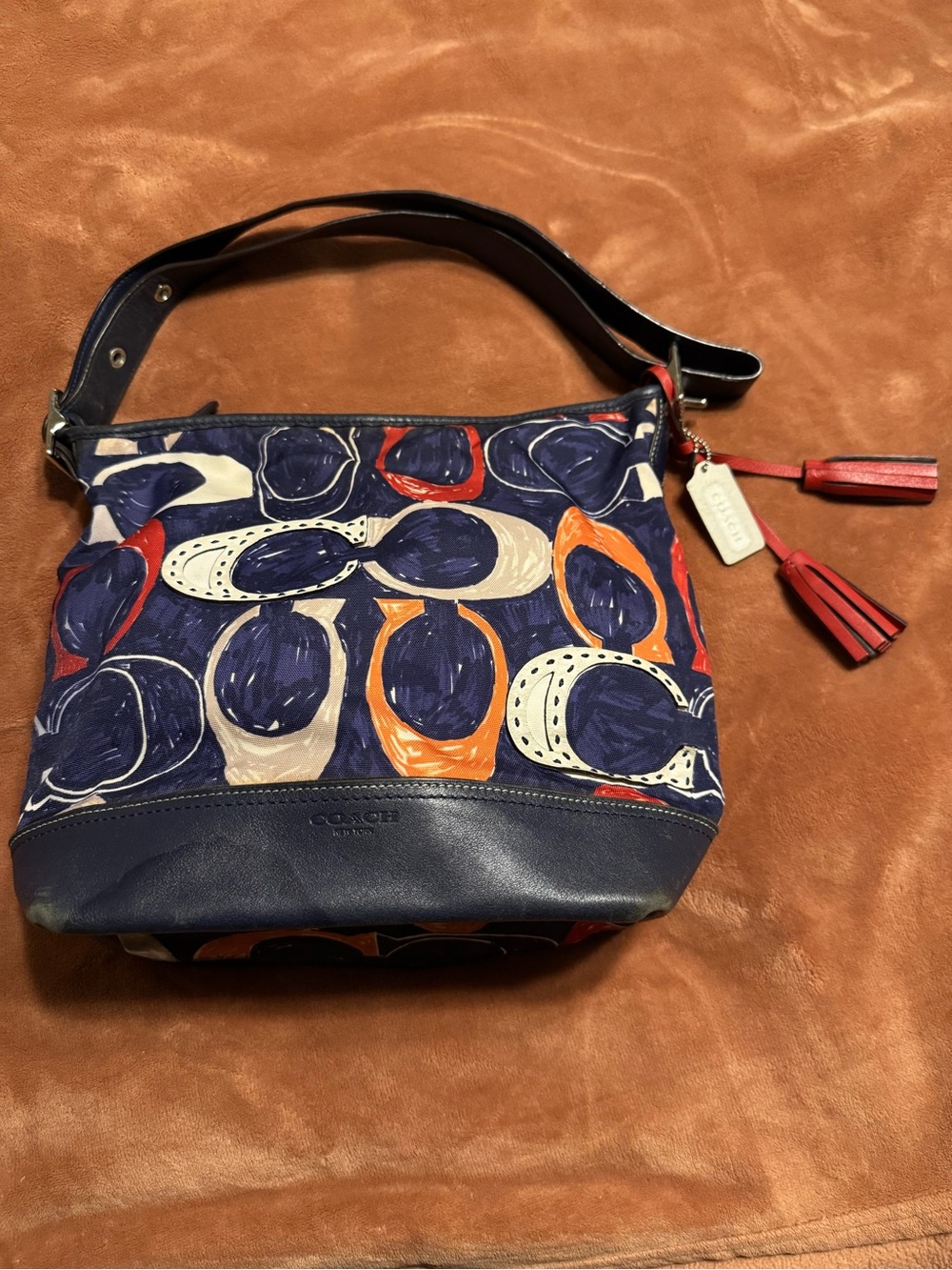 “VINTAGE” Coach Navy Multi-Print Leather-Trim Shoulder Bag with Red Tassel